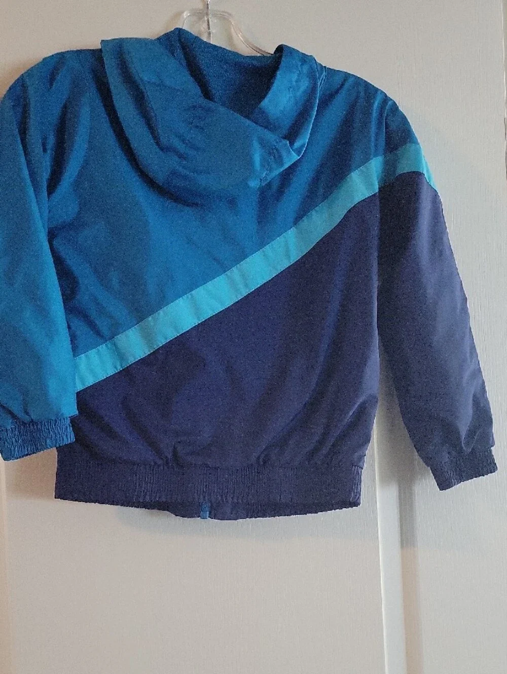Nike Kids Two-Tone Blue Hooded Rain Jacket with Teal Stripe